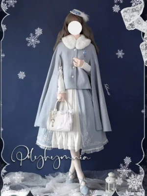 Classic lolita ensemble with detachable fur collar cape buttoned waistcoat and mini handbag accessory studio photograph