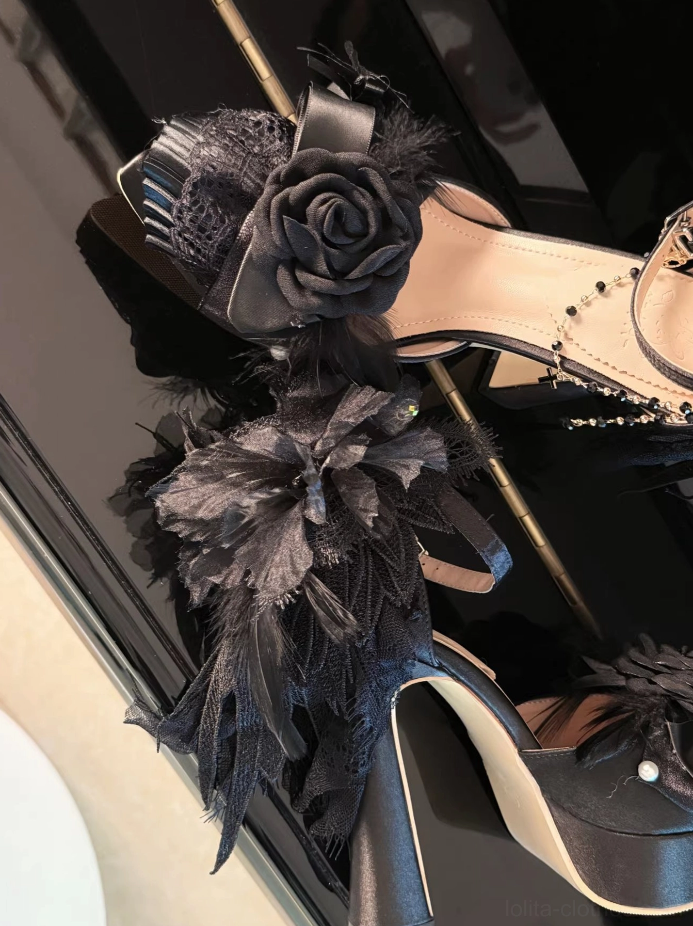 Classic lolita high heel shoes with feather back decoration, pointed toe silhouette, premium satin finish, and platform sole architecture for extended wear comfort
