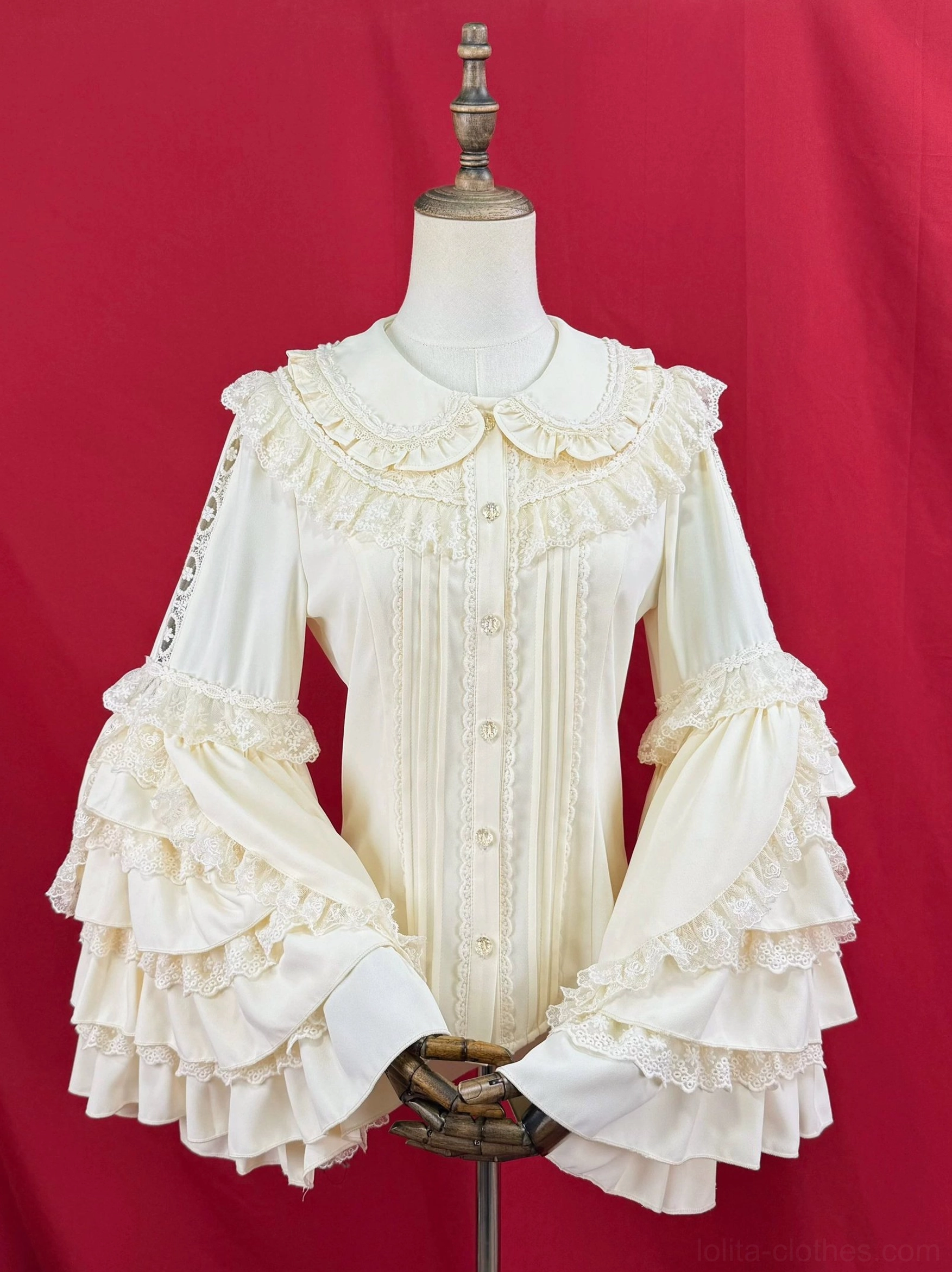 Classic Lolita hime sleeve blouse with Peter Pan collar, ivory cream white color, front view showing ruffled bell sleeves and lace placket details on mannequin