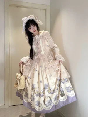 Classic lolita jsk floral print dress full-body front view on model with straw bonnet, cream and blue botanical garden design, victorian style jumper skirt