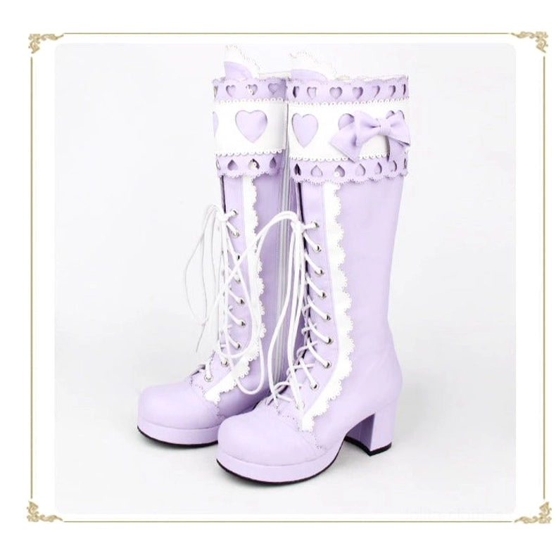 Light purple classic lolita mid-calf thick heel boots complete pair view in golden decorative frame showing full design details