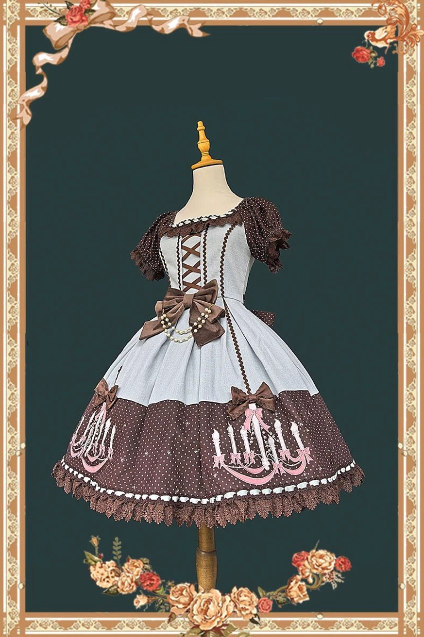 Back full display of classic lolita OP dress in light blue, brown and black tri-tone with off-the-shoulder ruffled sleeves, lace-up corset back, and polka dot sections with chandelier prints