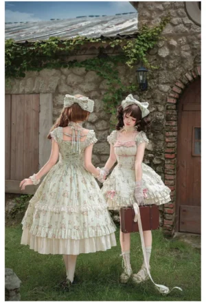 Back view of classic lolita rose print OP dress showing lace-up back panel and shirred design with tiered ruffled hem