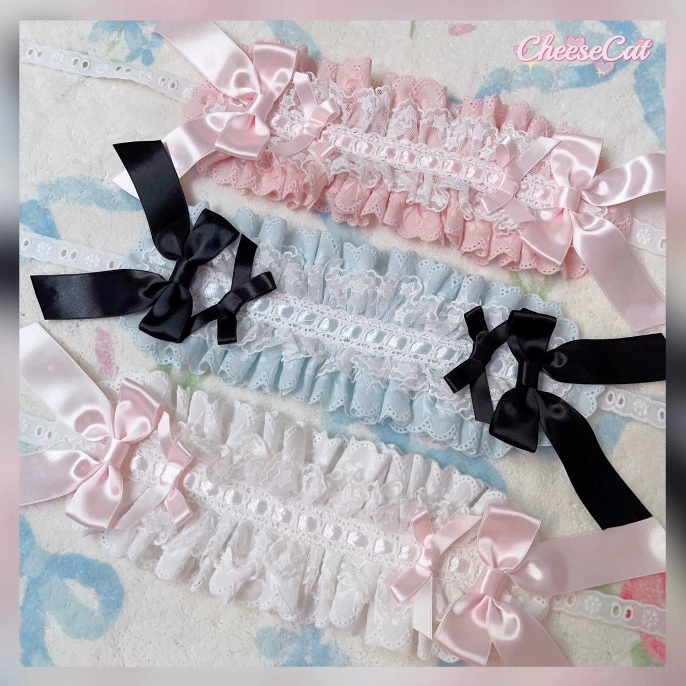 Classic Lolita ruffled lace hair headbands with black light blue and pink color sets neatly arranged showing decorative trim details
