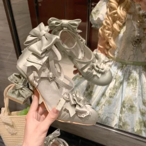 Silver classic Lolita satin bow heel shoes with large decorative bows on heel and vamp, gemstone buckle ankle strap, paired with floral lolita dress