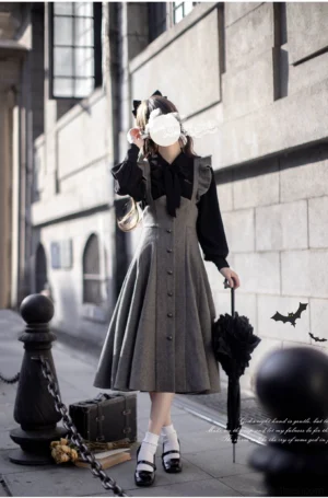 Classic Lolita Serena JSK dress set back three-quarter view elegant two-tone wool blend with ruffled shoulder strap and black long-sleeve inner shirt