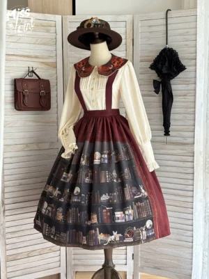 Three-quarter front angle classic lolita suspender skirt featuring dark brown library print, burgundy waist panel with detachable suspenders, styled with vintage fedora and black umbrella prop