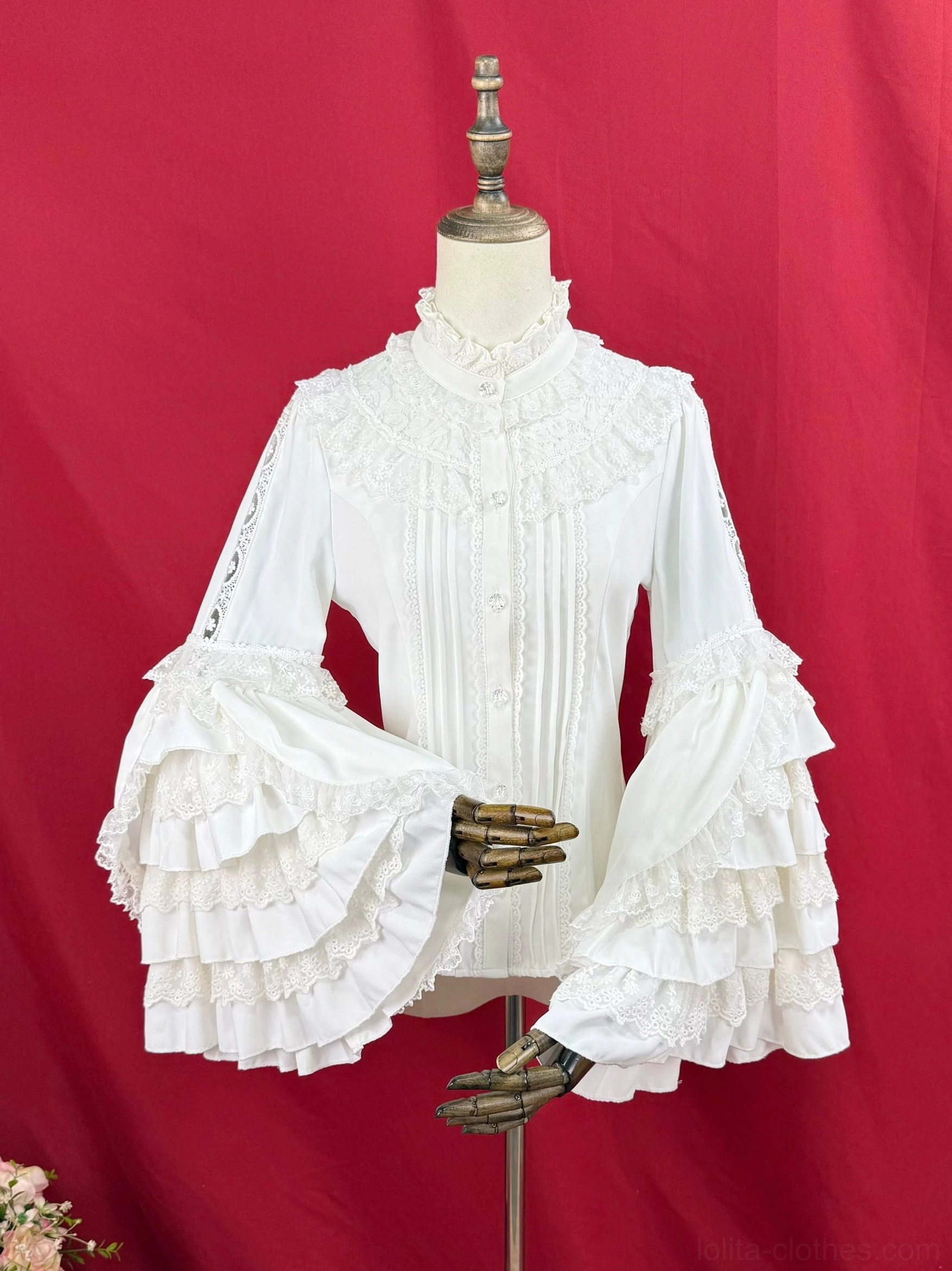 Classic Lolita stand collar blouse in cream ivory, right front side view showing high neckline, voluminous ruffled bell sleeves with layered construction