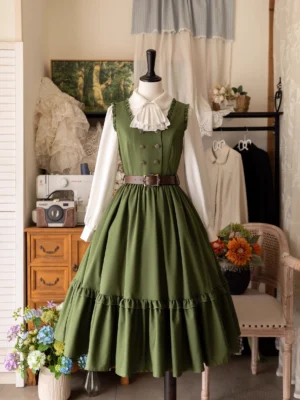 Sage green classical Lolita JSK jumper skirt dress with detachable jabot white blouse full front view on mannequin vintage boutique studio