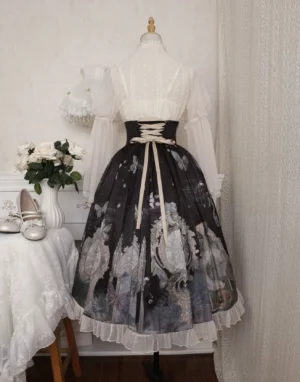Gothic Lolita corset skirt and blouse separated on dress form, back three-quarter view showing vintage oil painting print and cream ruffled hem with lace-up details