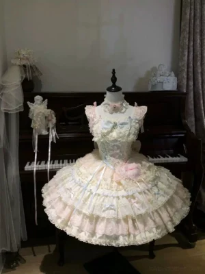 Cloud Whale Dream Sweet Lolita Corset JSK Dress front flat lay pastel macaron tiered ruffle hem vintage piano background