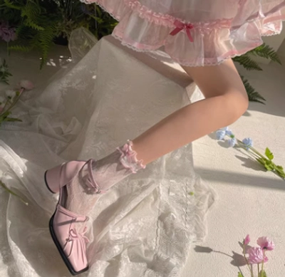 Complete Lolita ankle socks collection all seven ribbon bow color variants displayed together showing white and black sock options with coordinating accents