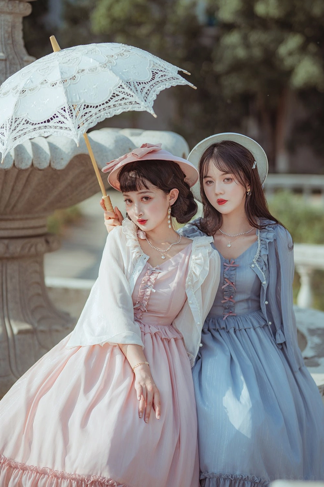 Complete Rhine riverside lolita coordinate featuring cardigan overlay, matching jumper skirt dress, delicate accessories, and styled presentation demonstrating authentic lolita fashion expression