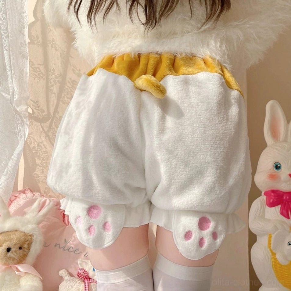 Detail shot of white velvet corgi-tail Lolita bloomers showing elastic waistband construction ruffled leg design and overall garment construction quality