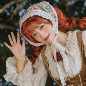 Country lolita head bonnet accessory with delicate floral embroidery and lace edging front close-up view