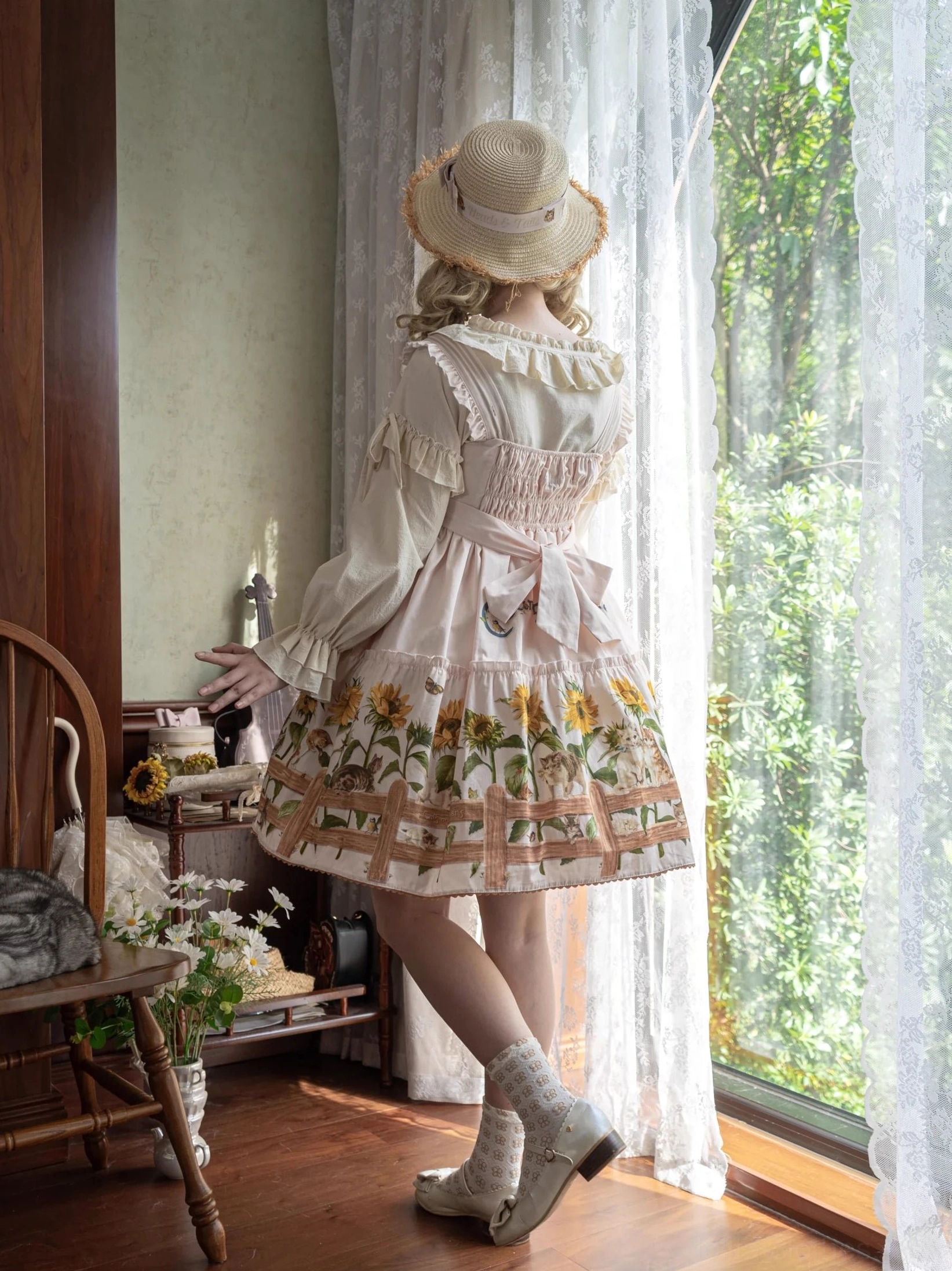 Styled country lolita coordinate showing JSK dress with coordinated blouse and accessories ensemble