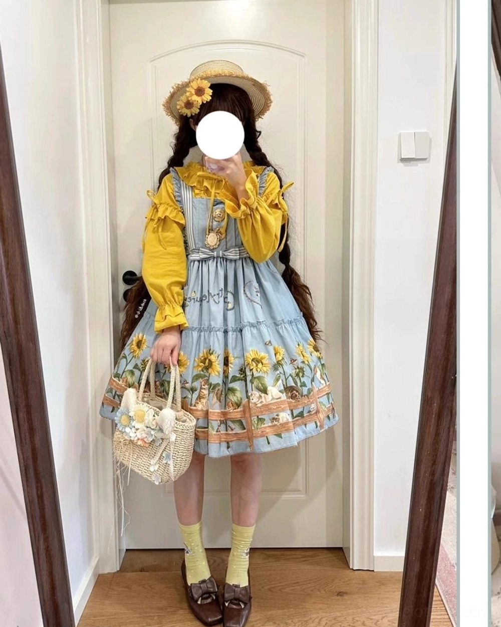 Country lolita dress hem detail showing sunflower and cat print quality tiered ruffle construction