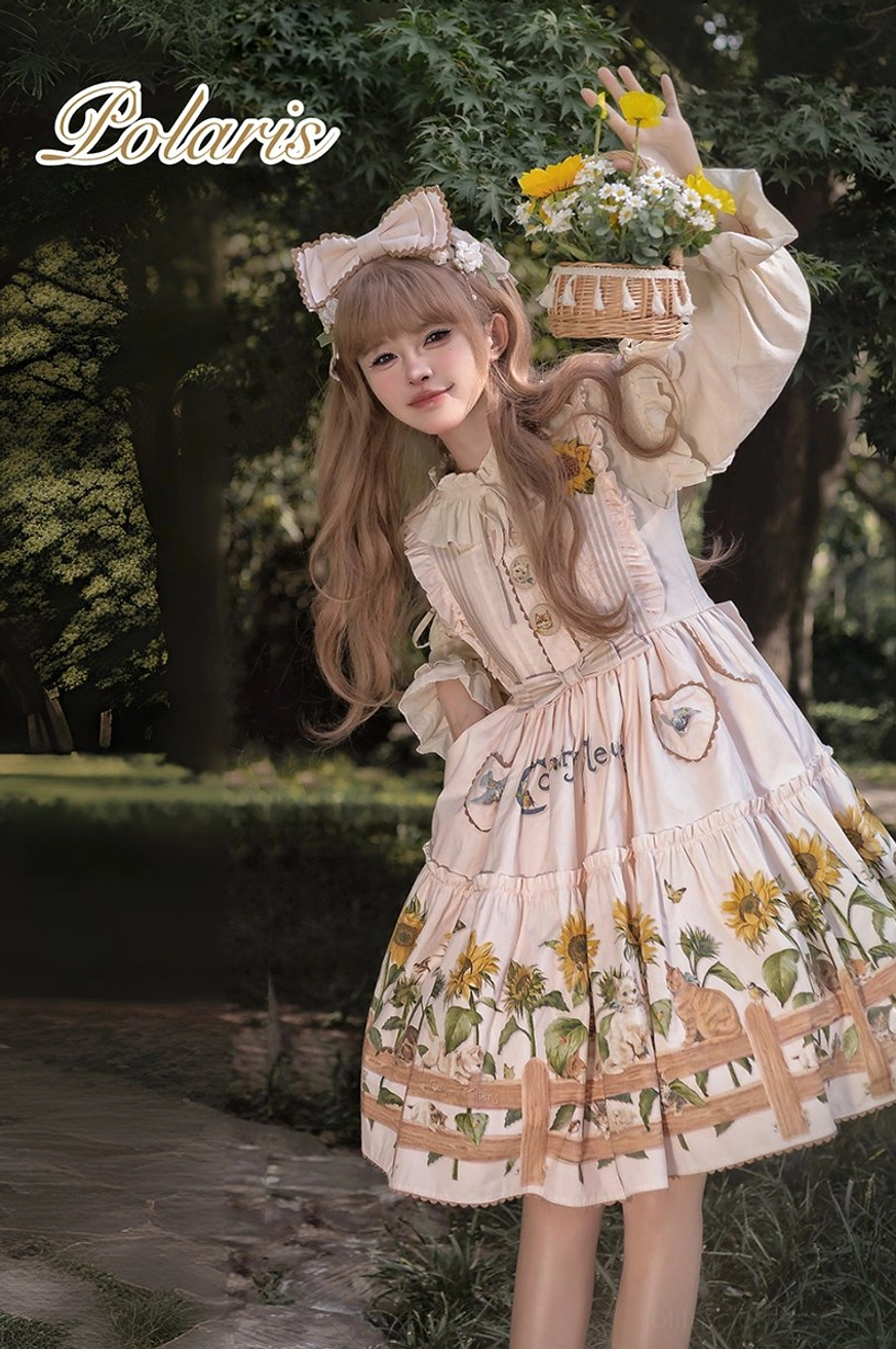 Front view of country lolita dress showing decorative ribbon details and tiered skirt construction
