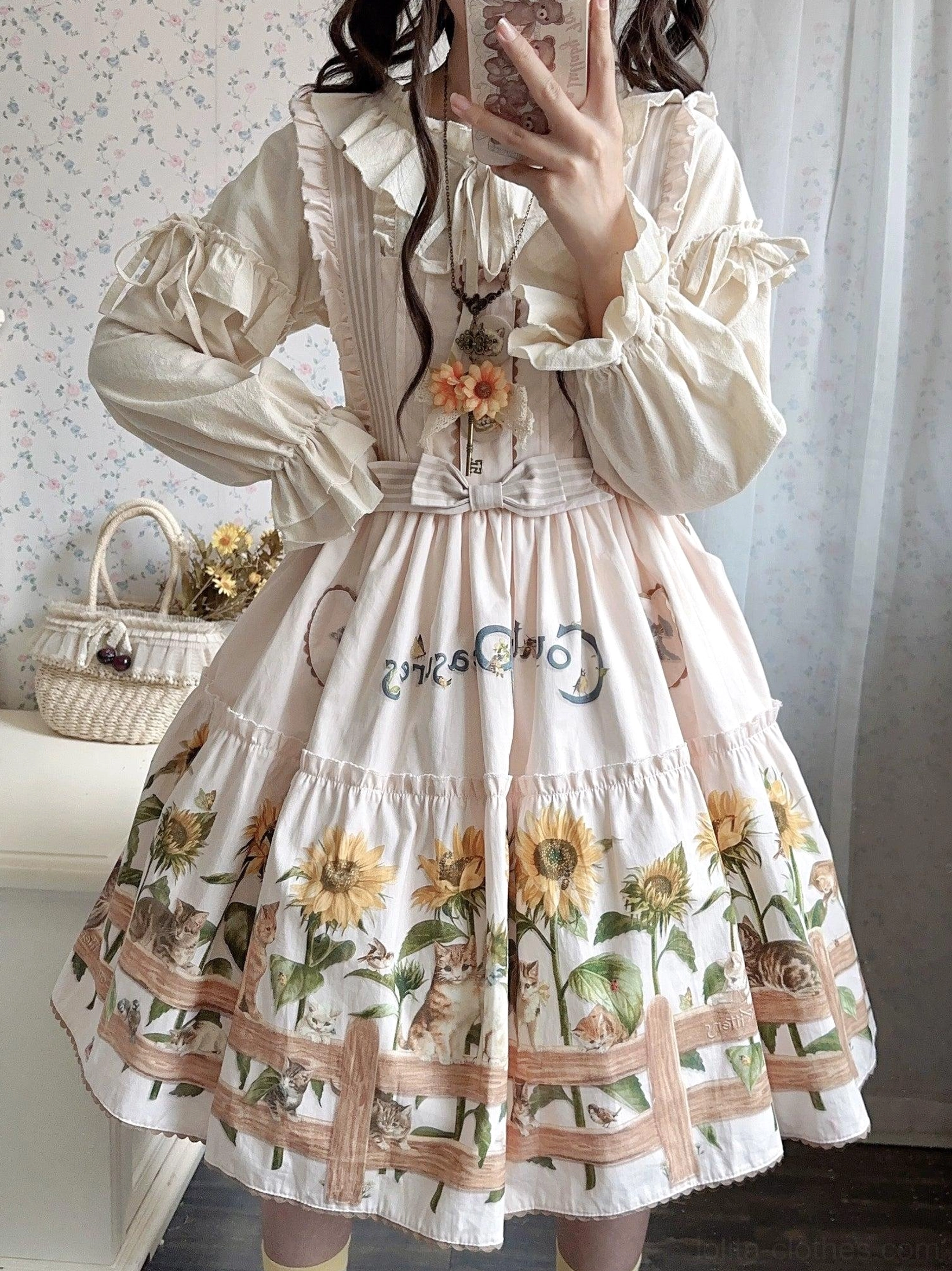 Lifestyle shot of country lolita dress worn for tea party gathering showing practical daily wearability