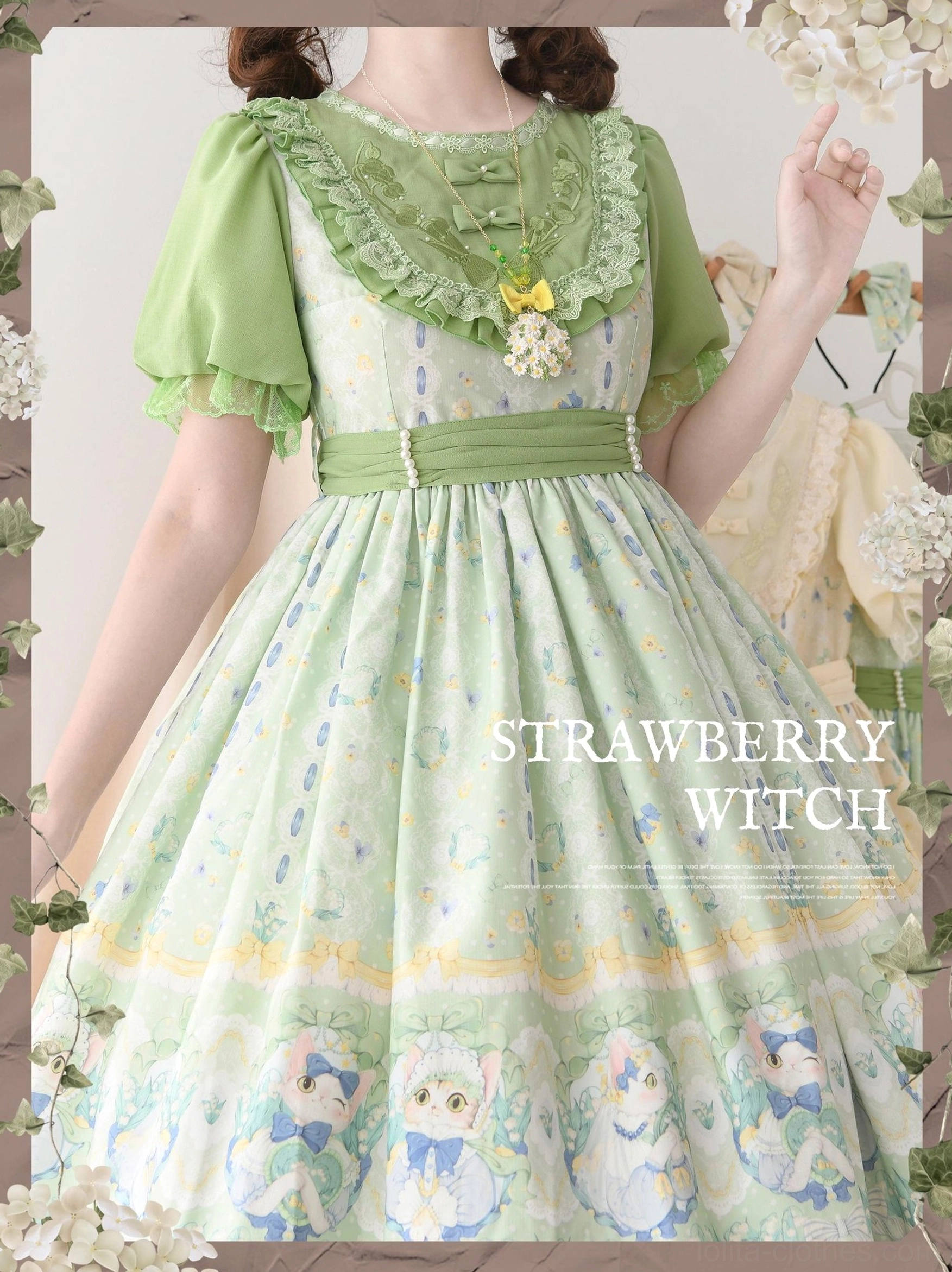 Green country lolita OP dress upper body close-up showing ruffled lace neckline, waist sash with pearl trim, short puffed sleeves and embroidered details