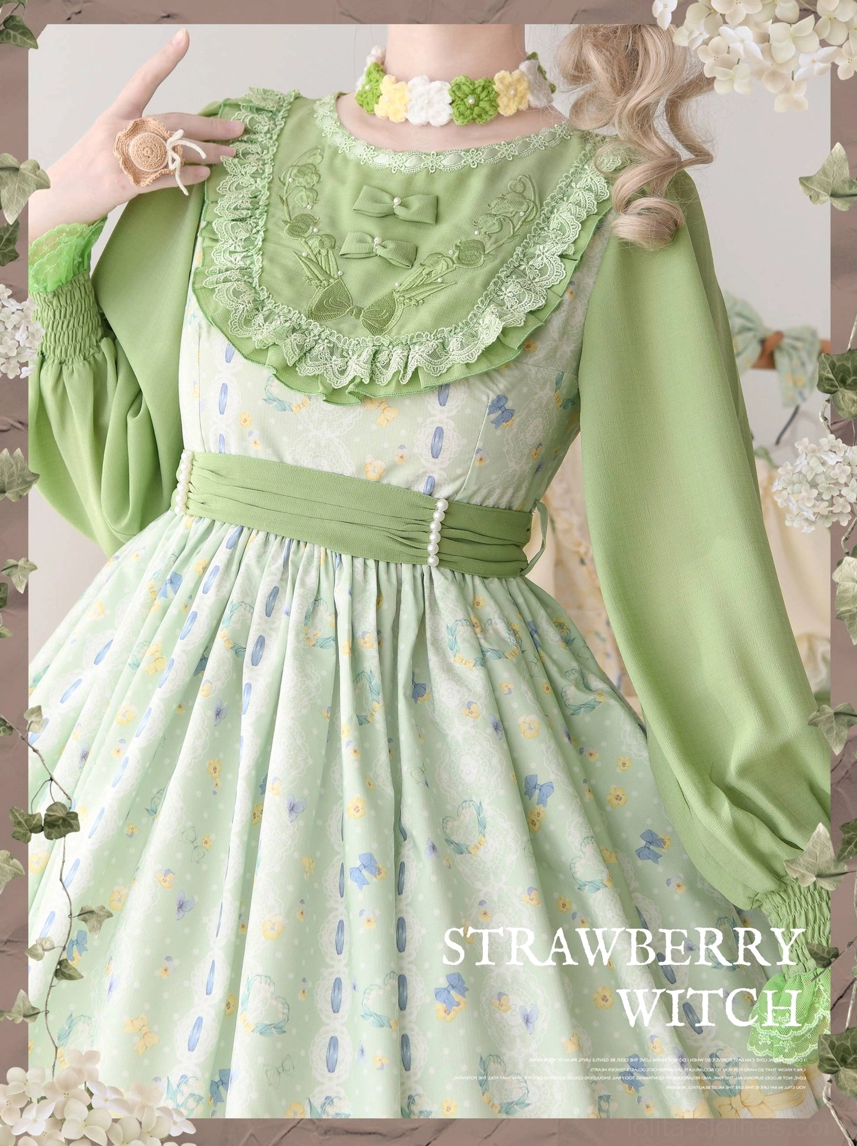 Green long-sleeve country lolita OP dress neck area close-up showing embroidered lily lace ruffled neckline, satin waist belt with pearls and brand details