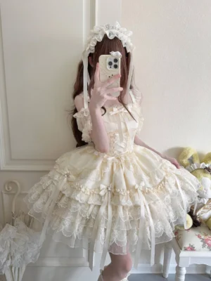 Cream beige sweet lolita jumper skirt with corset-style bodice and layered lace ruffled skirt, paired with cream hairband in full-body mirror photo