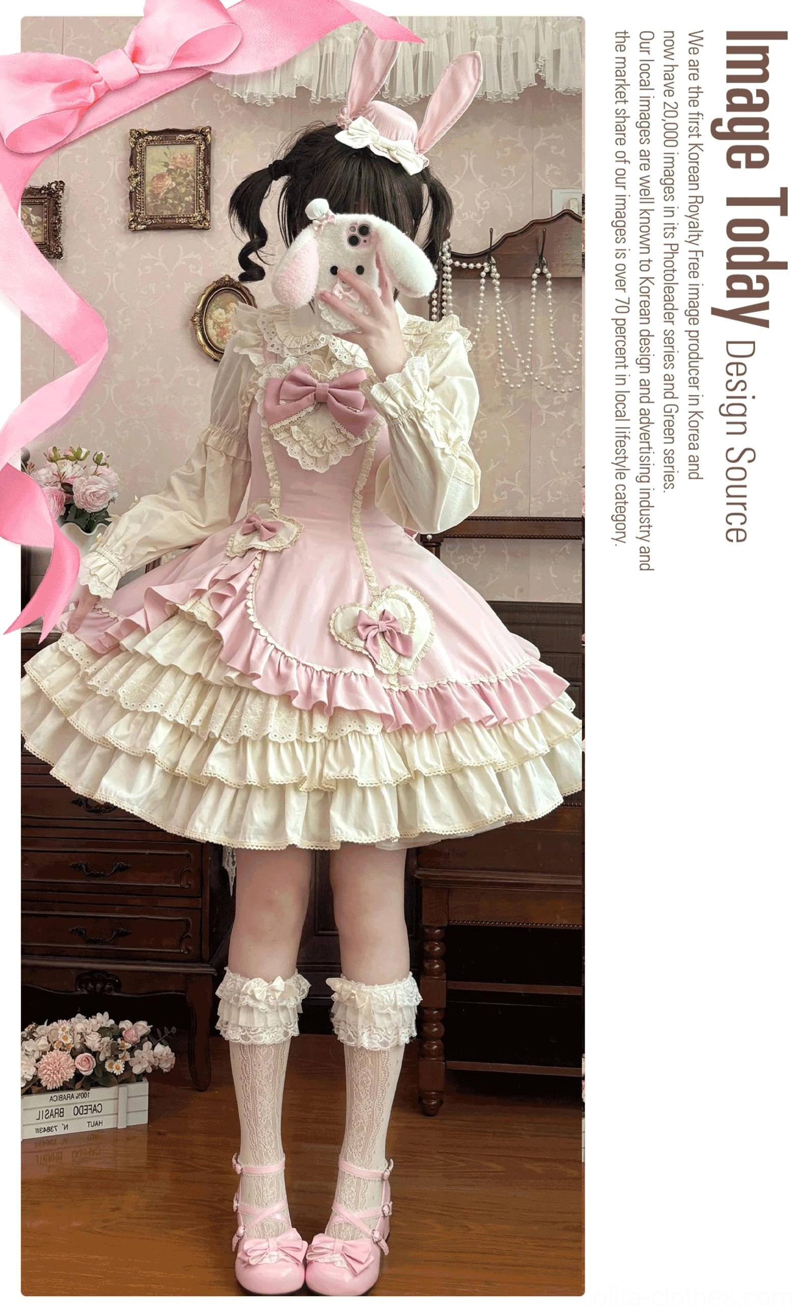 Cream Bud tiered old school lolita JSK detail close-up showcasing ruffled hem Peter Pan blouse collar lace ruffles and heart trims