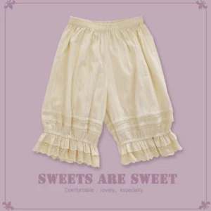 Cream yellow lolita cotton bloomers front view elastic waistband vertical striped fabric hollow embroidered ruffled lace hem