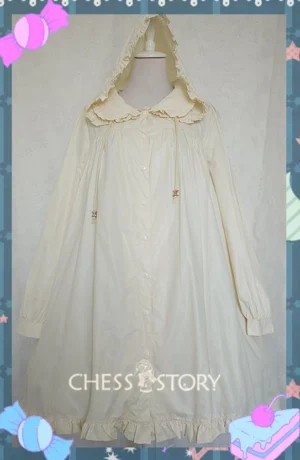 Cream beige yellow Lolita raincoat full front view with Peter Pan collar ruffled trim attached hood and button closure on dress form