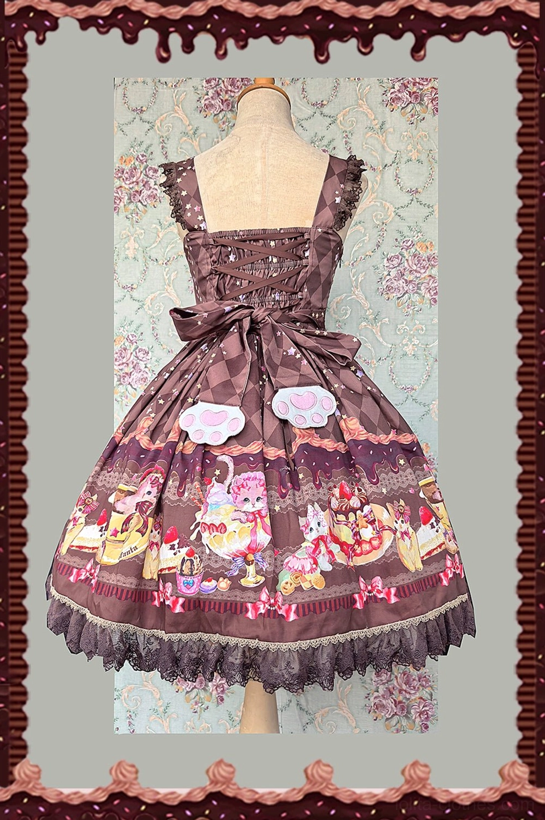 Dark brown sweet lolita jumper skirt back view showing corset lace-up back, large decorative back bow, dark ruffled lace hem, cloud waist patches
