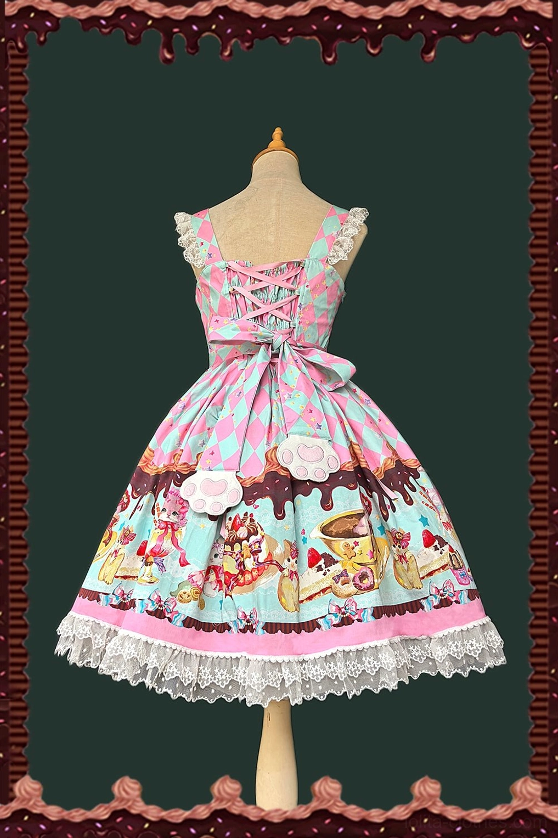 Pink sweet lolita jumper skirt back view with corset lace-up back closure, large decorative back bow, white ruffled lace hem, and cat dessert prints