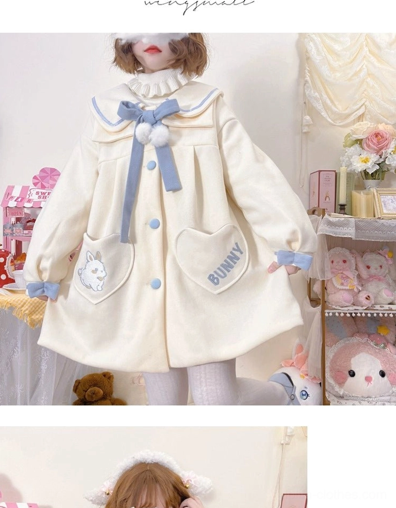 Cream off-white plus size sweet lolita wool overcoat front standing view neat button arrangement all decorative elements collar bow pom-poms heart pockets clearly visible