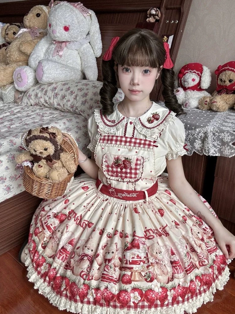 Cream-red colorway sweet lolita salopette jumper with gingham chest pocket, embroidered strawberry details, lace hem and strawberry trim, teddy bear basket prop vintage bedroom