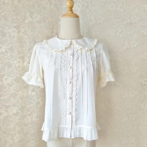 Cream white Peter Pan collar lolita blouse with ruffled lace cuffs and collar trim front-facing on dress form displaying delicate feminine details