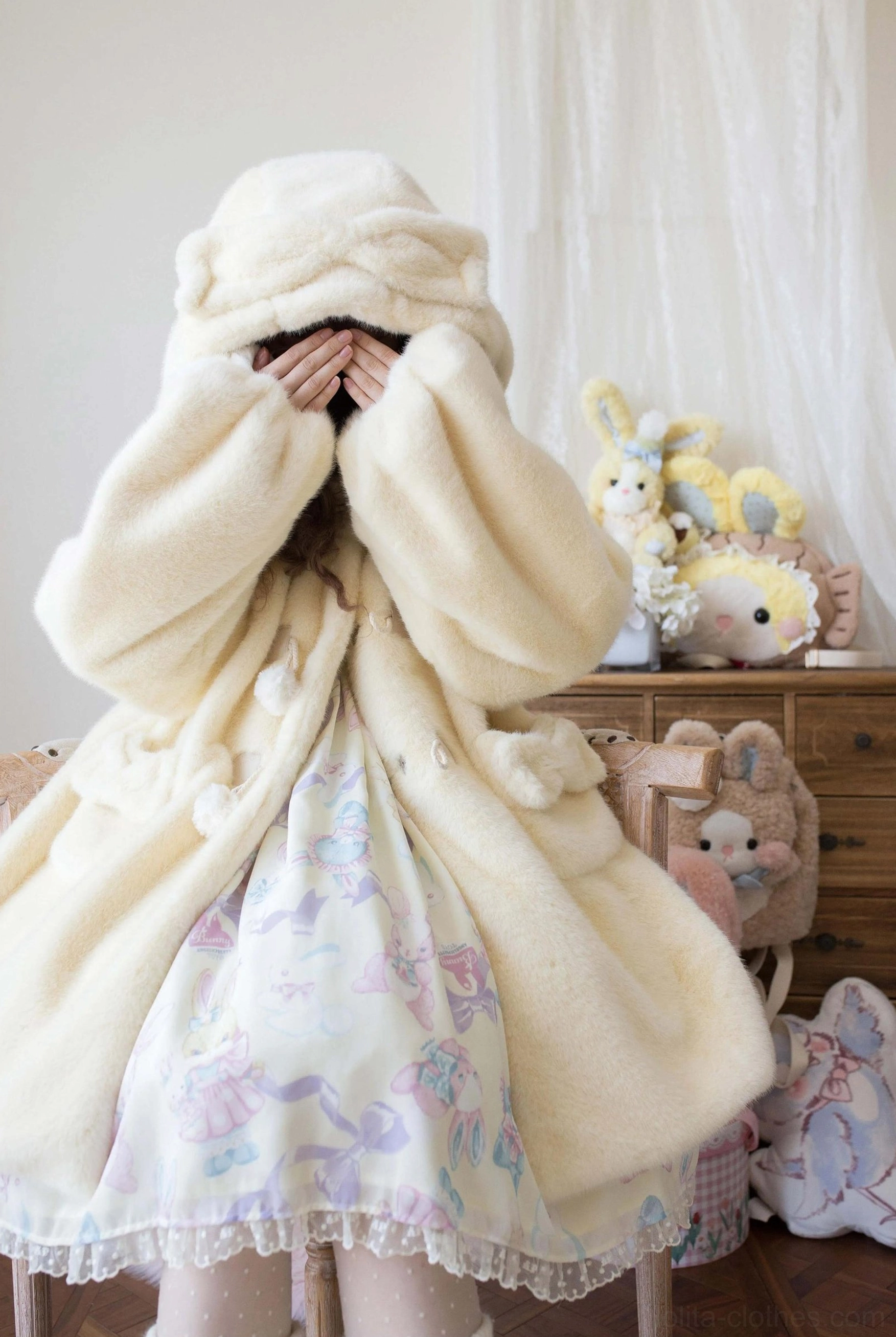 Cream yellow lolita winter thickened fluffy overcoat with bear ear hood and fuzzy fleece fabric, full-body view with hood covering face, oversized loose fit