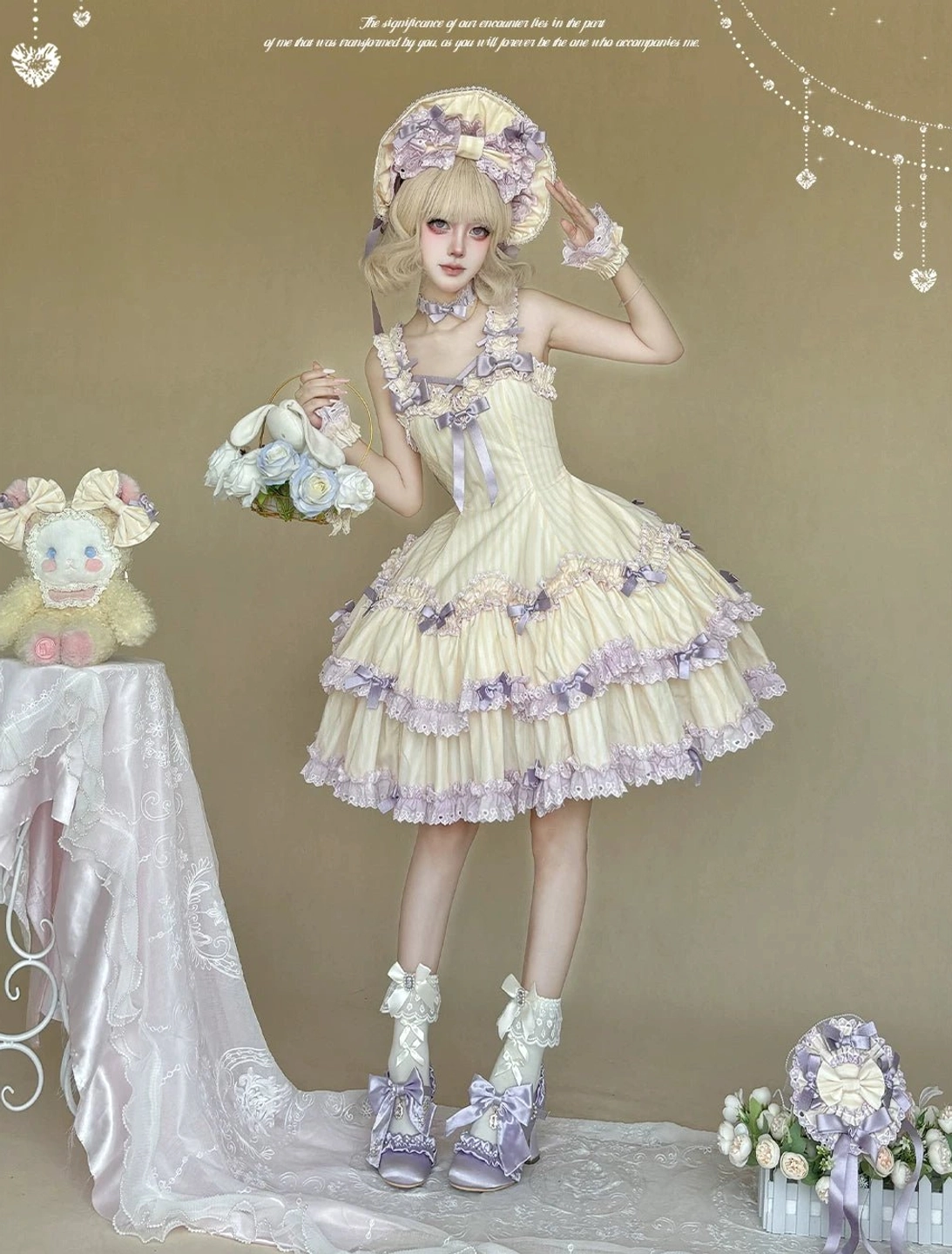 Cream yellow and purple striped classic Lolita dress front full-body studio shot with floral hair accessory, tiered ruffled skirt and bridal bouquet prop