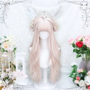 Light pink blonde wavy lolita wig with feathered air bangs on mannequin, front view with tiara and wing flower accessories on glittery sequin backdrop