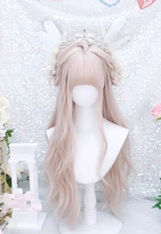 Ash pink blonde wavy lolita wig with feathered air bangs worn on mannequin, decorative tiara and wing flower accessories, glamorous glittery sequin backdrop setting