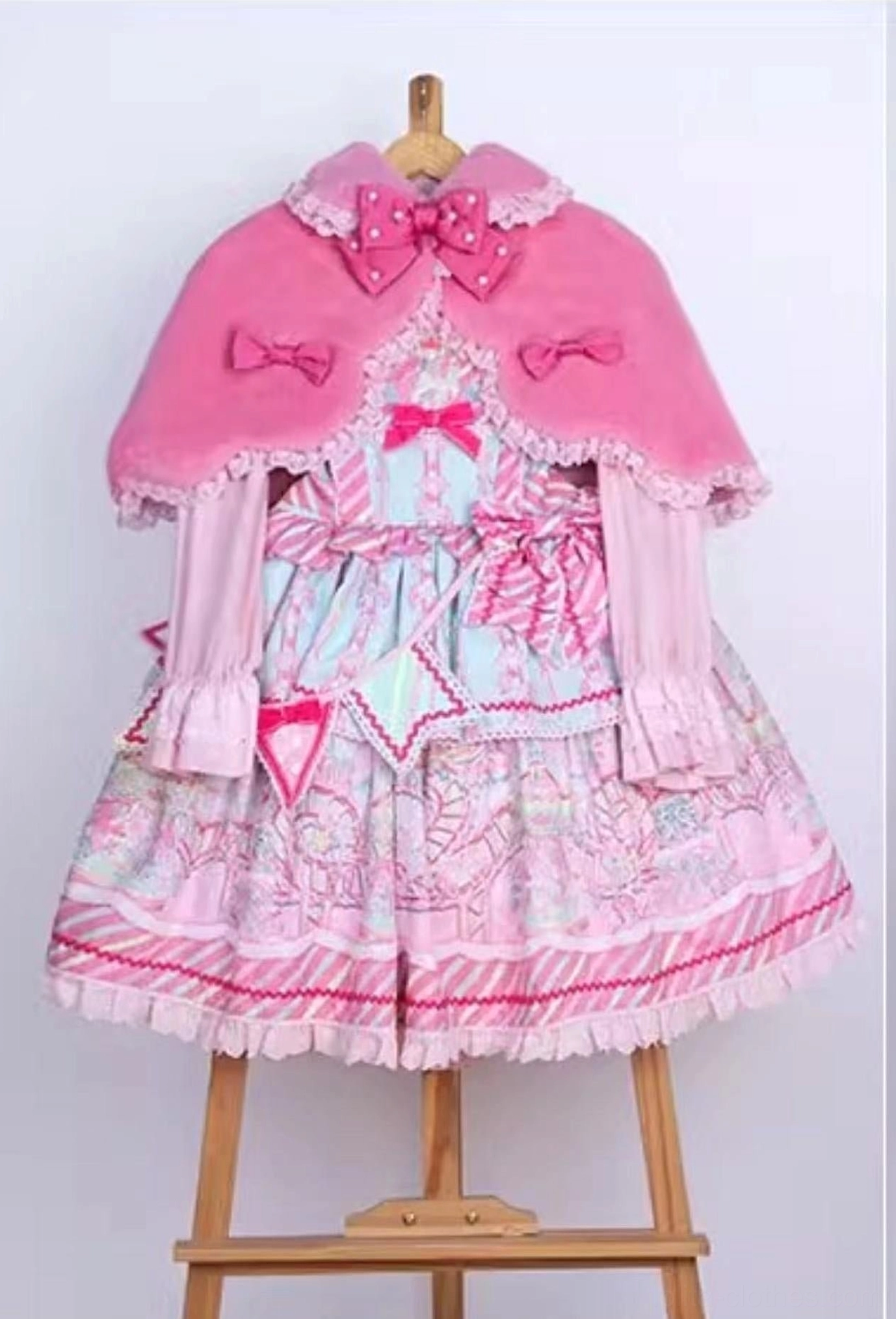 Crepe satin lining detail of plush Lolita cape showing quality construction and interior finish