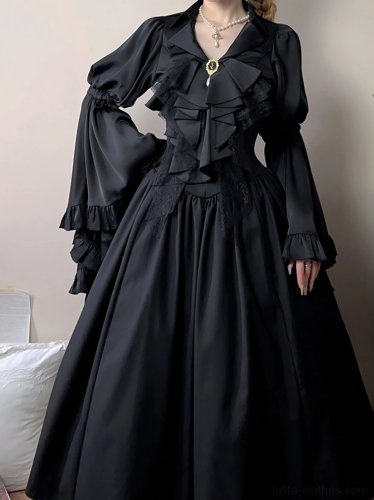 Side-back view of a black Gothic Lolita vintage dress coordinate styled with the Crow's Dinner detachable jabot collar accessory