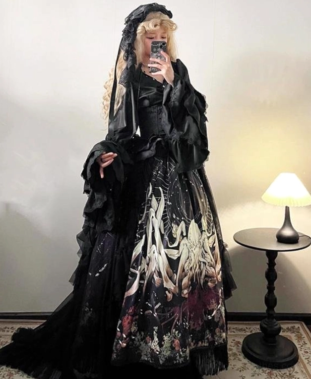 Cthulhu Gothic Lolita two piece indoor mirror side view blonde model black ruffled bell sleeve blouse corset waist octopus print skirt tulle trailing veil
