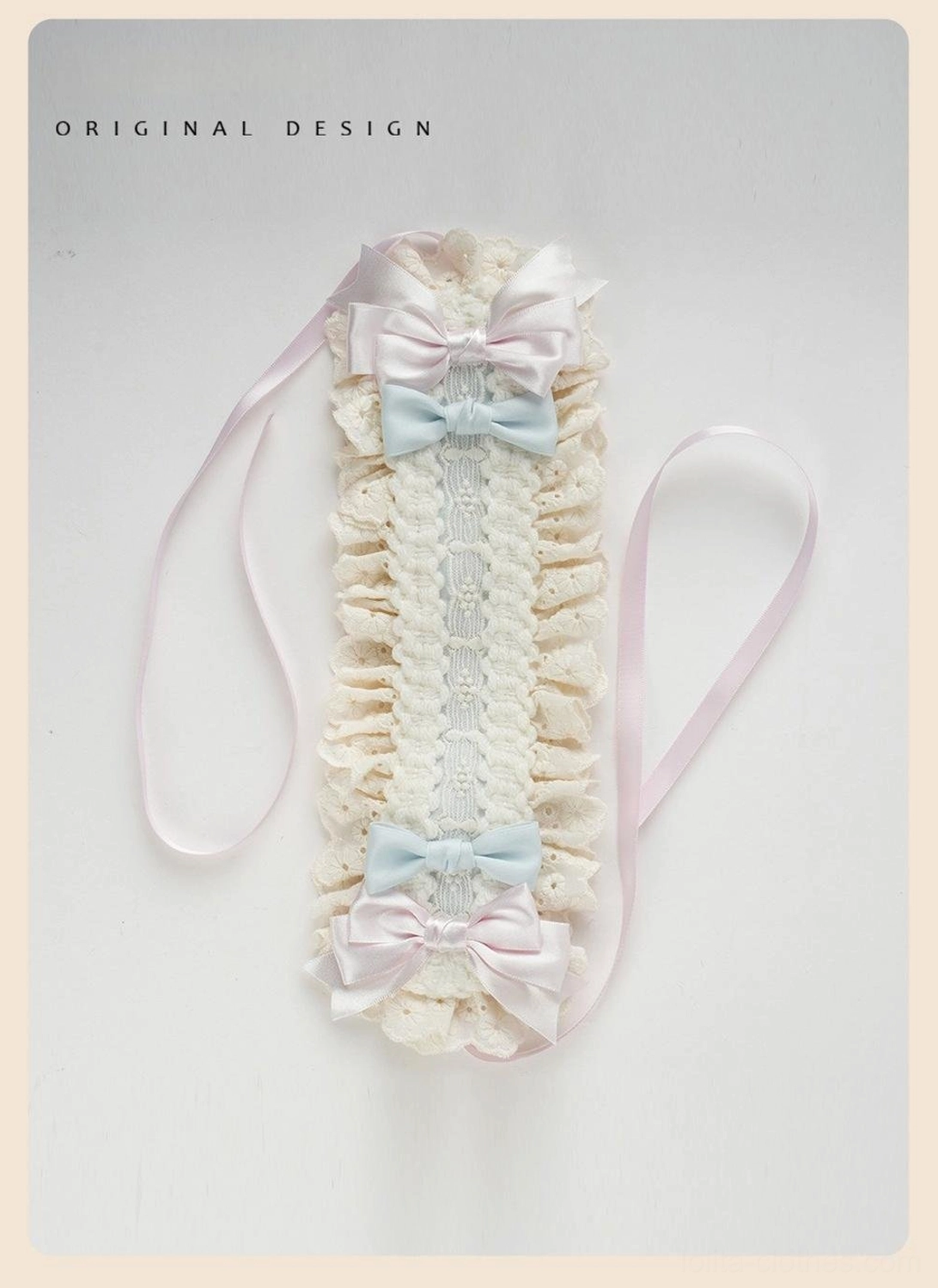 Cupcake sweet lolita headpiece collection detail shot showing beige ruffled lace trims, pink gingham bows, light blue satin frilled bow accents, texture close-up