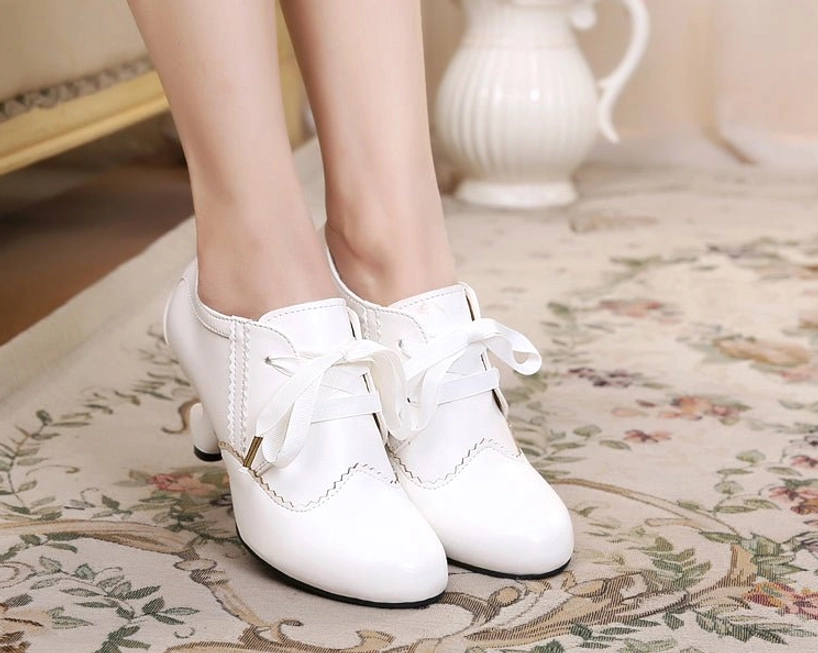 Cyan blue pastel Lolita Mary Jane retro high heel shoes with scalloped edge detailing, curved spool heel, and ribbon lace closures, ideal for dreamy ethereal summer Sweet Lolita coordinates