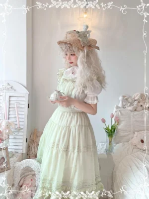 Half-body detailed view of pastel cyan Lolita salopette with white puff-sleeve blouse lace collar and delicate neckline styling