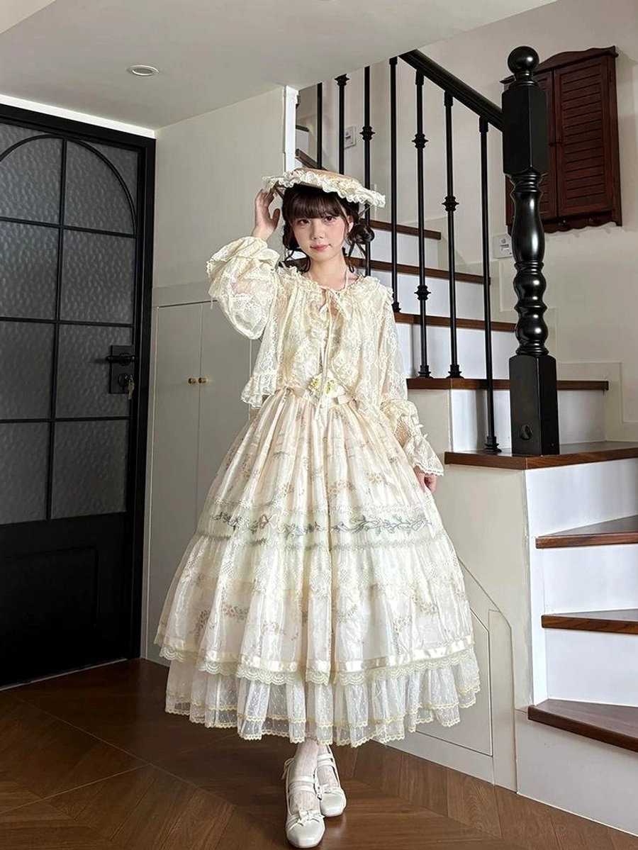 Side view of Daisy Poetry sleeveless classic lolita JSK dress model wearing white loafers lace trimmed socks flower crown tiered silhouette