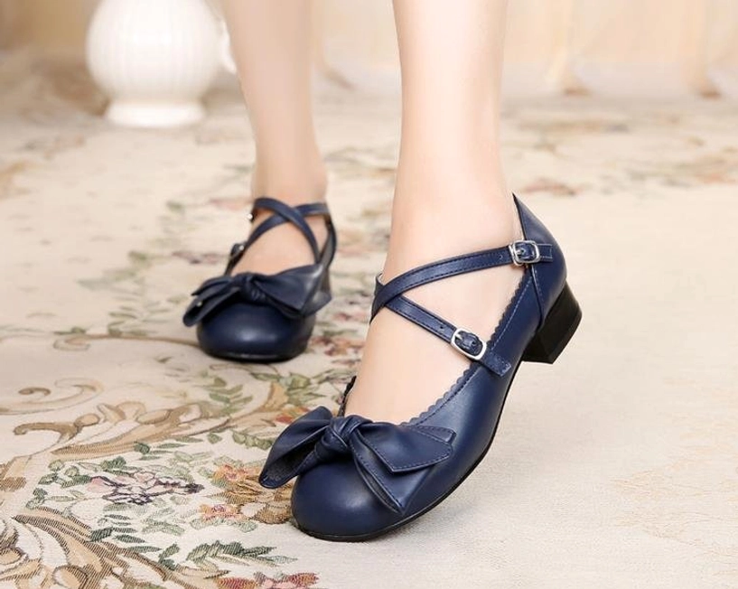 Dark cyanotic blue bow cross-strap lolita leather shoes front view model vintage floral background