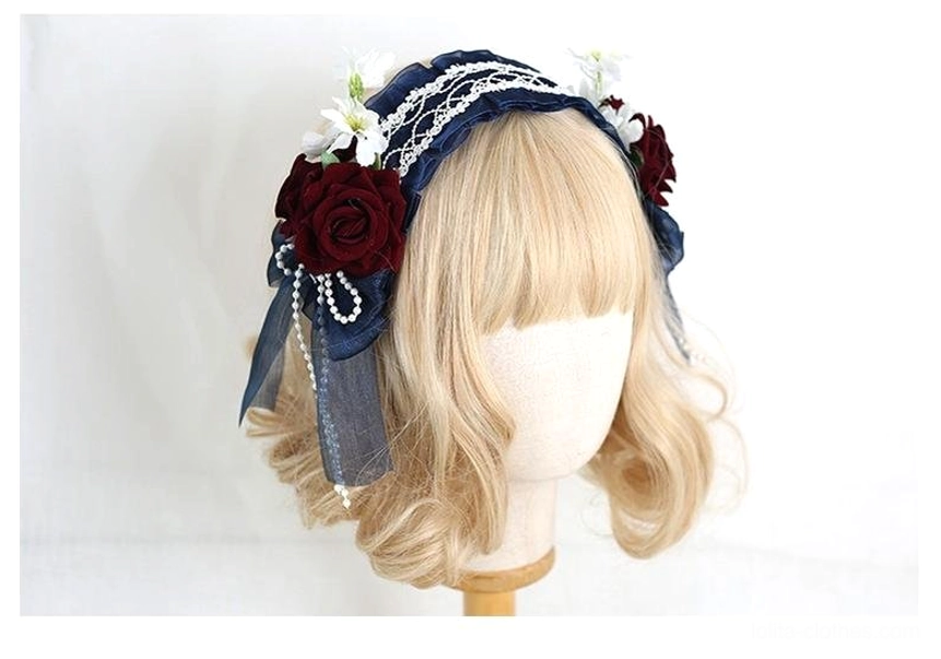 Dark blue lolita floral lace headband with retaining clip and artificial flowers on mannequin model