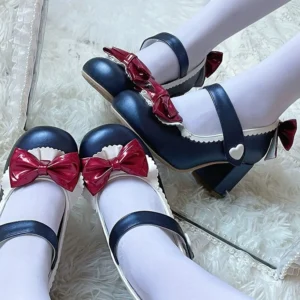 Glossy dark blue patent leather Lolita Mary Jane high heel shoes with wine red bow decorations and heart-shaped strap buckle displayed on white fluffy fur with white stockings