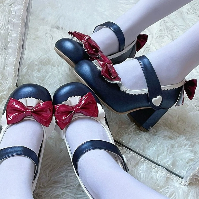Glossy dark blue patent leather Lolita Mary Jane high heel shoes with wine red bow decorations and heart-shaped strap buckle displayed on white fluffy fur with white stockings