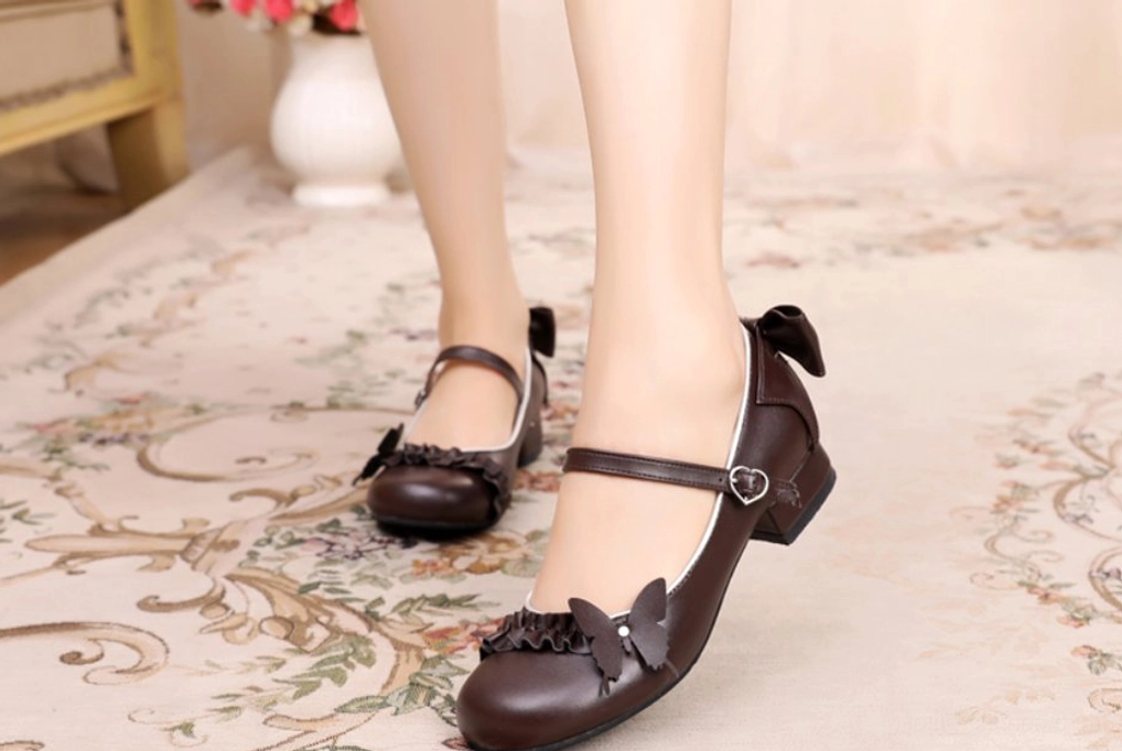 Dark brown sweet Lolita Mary Jane shoes with ruffle toe cap and rear bow ornament heart buckle strap overhead shot